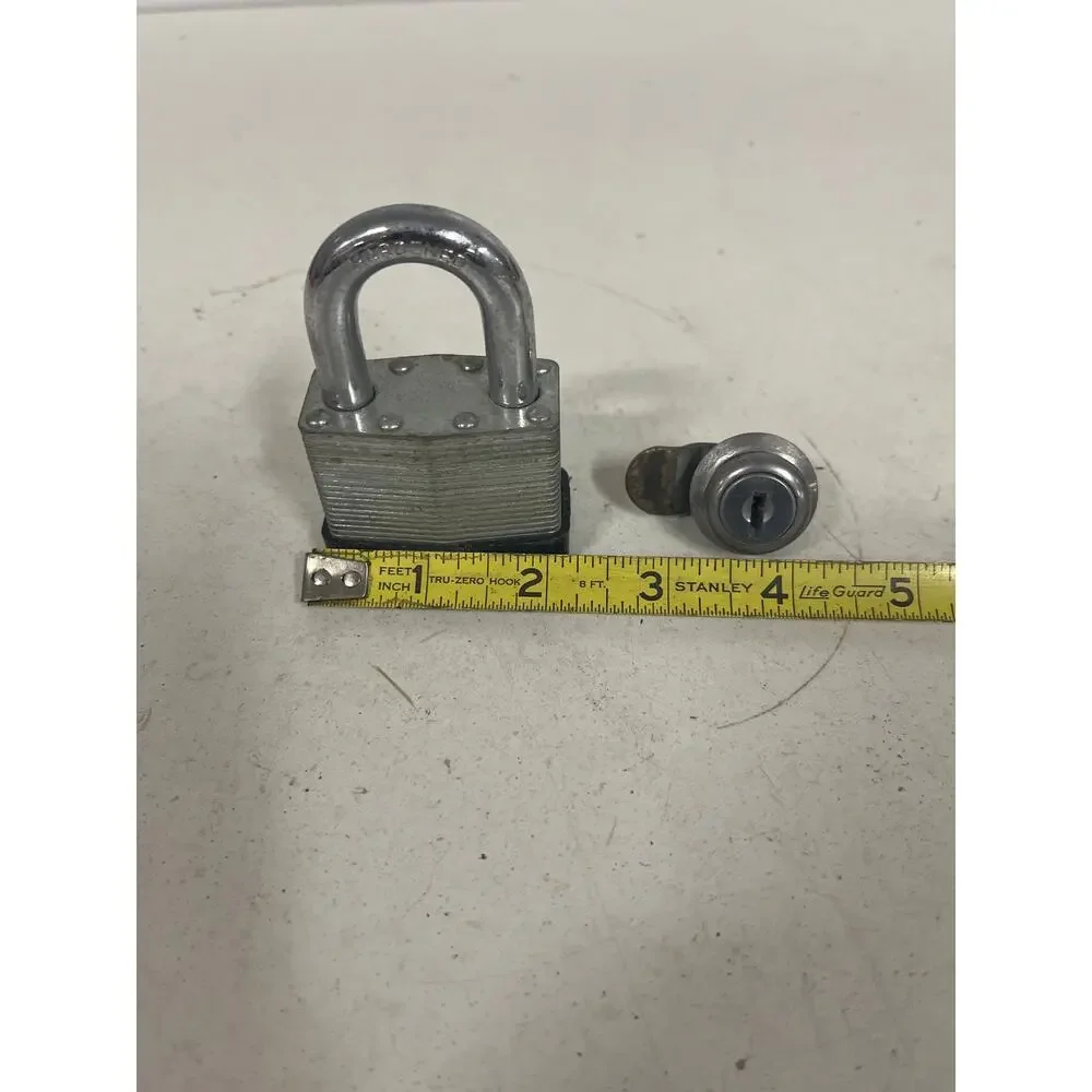 2 locks a door/cabinet lock and padlock both w/o key